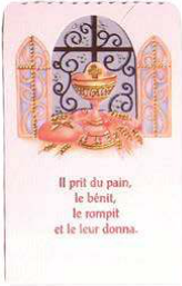 Il prit du pain, le bénit, le rompit et le leur donna.